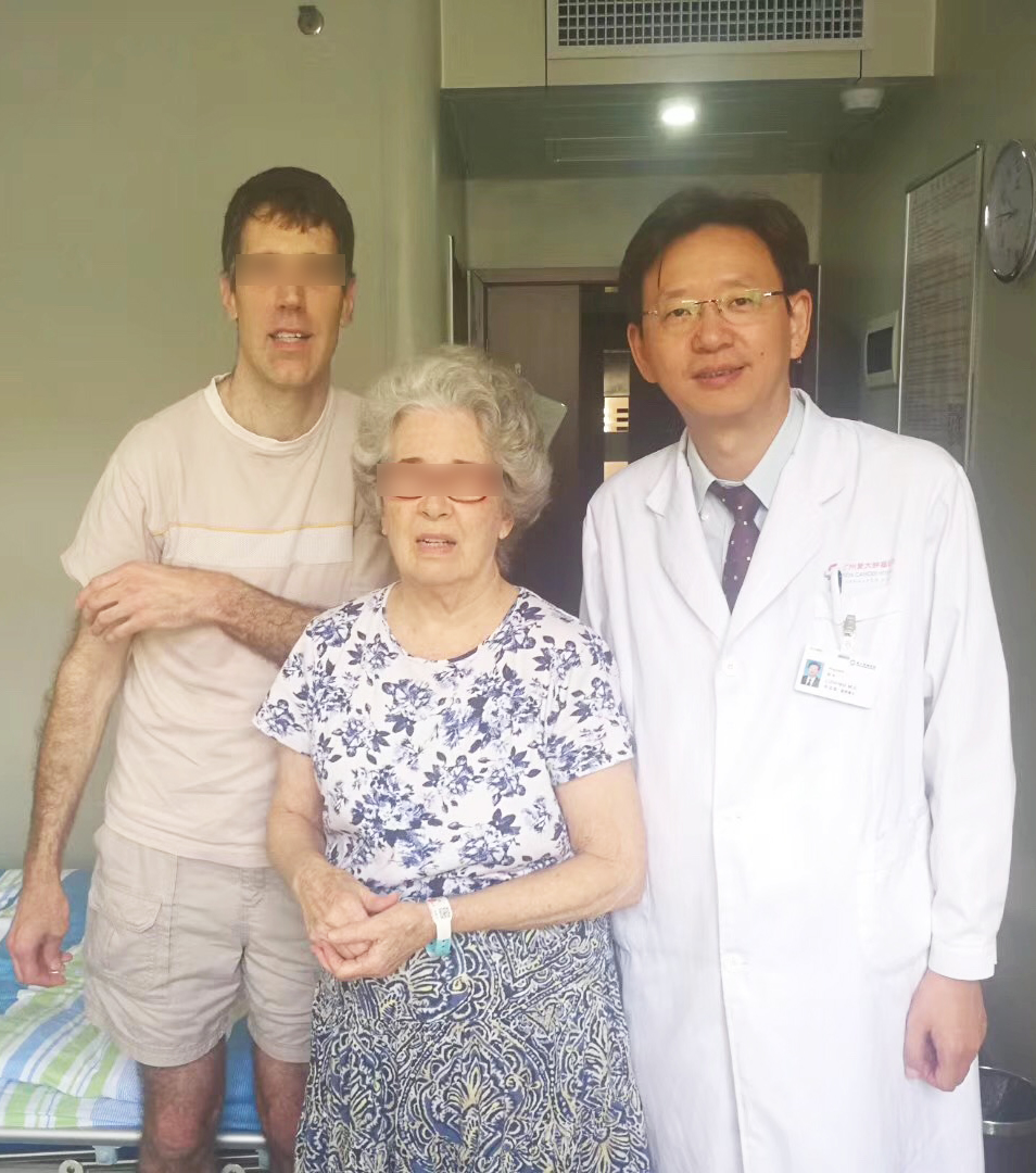 Mary her son and Dr. Niu.jpg
